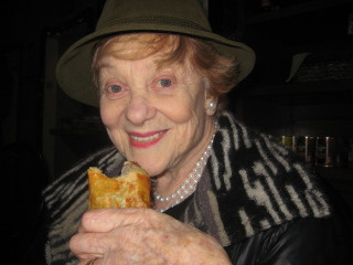 Denise eating John Campbell Irish Bakery pastie John Campbell Irish Bakery, bakery, san francisco, Nancy D. Brown, travel