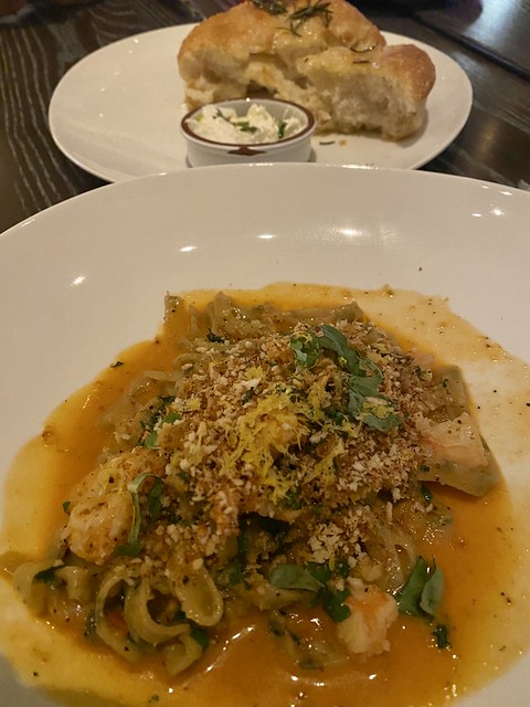 Seafood fettuccine with shrimp and lobster and homemade focaccia bread with house made fresh ricotta are two of the dishes we ordered at Bobby Flay's Almafi restaurant at Caesars Palace Las Vegas. 