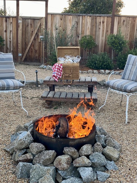 The Monterey Bay Airbnb Experience includes s'mores by the outdoor fire pit, a bottle of red wine and a wicker basket to use while you enjoy the blazing fire. 